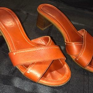 Burnt orange Coach pumps
